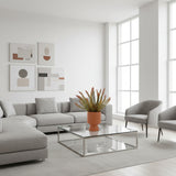 Artificial plant in a terracotta pot on a white background